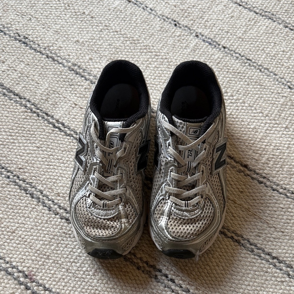 New Balance Silver and Black Athletic Shoes